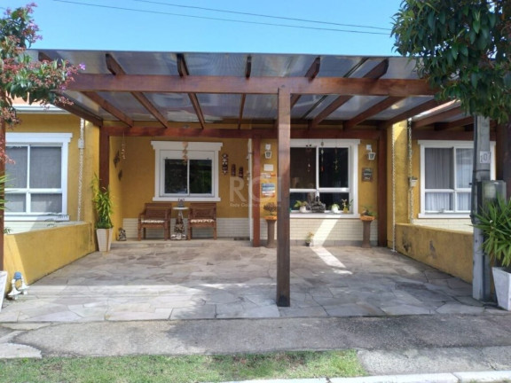 Imagem Imóvel com 3 Quartos à Venda, em Hípica - Porto Alegre Imagem Imóvel com 3 Quartos à Venda, em Hípica - Porto Alegre