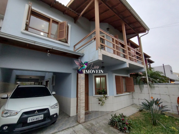 Imagem Casa com 3 Quartos à Venda, 219 m² em Centro Novo - Eldorado Do Sul Imagem Casa com 3 Quartos à Venda, 219 m² em Centro Novo - Eldorado Do Sul