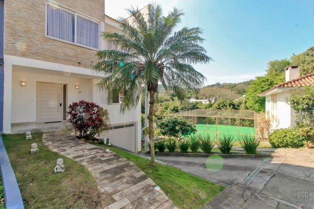 Imagem Casa de Condomínio com 3 Quartos à Venda, 205 m² em Vila Nova - Porto Alegre