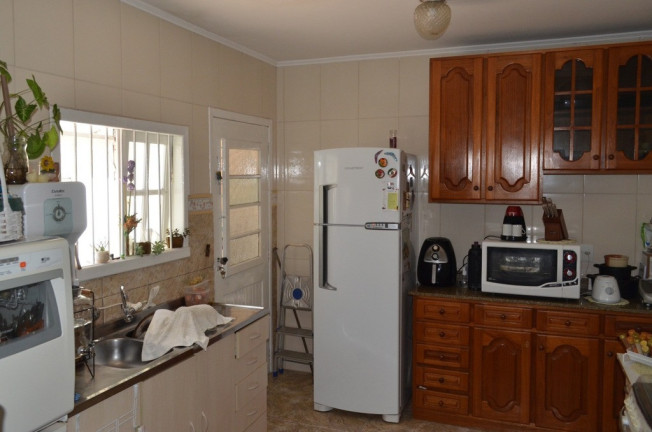 Imagem Casa com 3 Quartos à Venda, 113 m² em Harmonia - Canoas Imagem Casa com 3 Quartos à Venda, 113 m² em Harmonia - Canoas