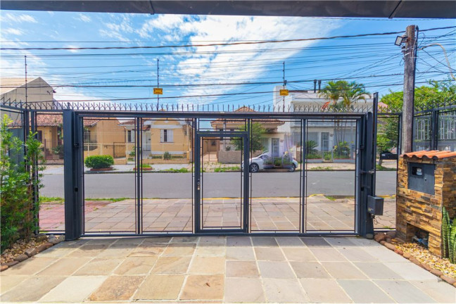 Imagem Casa com 3 Quartos à Venda, 220 m² em Partenon - Porto Alegre Imagem Casa com 3 Quartos à Venda, 220 m² em Partenon - Porto Alegre