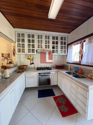 Imagem Casa de Condomínio com 4 Quartos à Venda, 260 m² em Vale Encantado - Campos Do Jordão