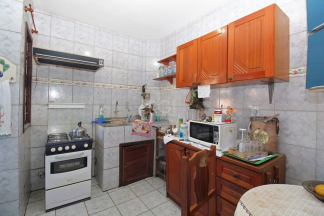 Imagem Casa com 4 Quartos à Venda, 300 m² em Glória - Porto Alegre Imagem Casa com 4 Quartos à Venda, 300 m² em Glória - Porto Alegre